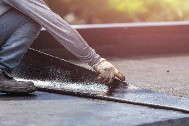 Professional Emergency Waterproofing technician working in Massapequa, NY